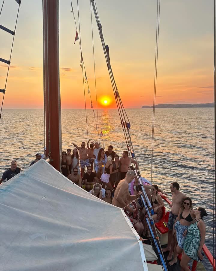 Boat cruise experience in Greece with snorkeling spots and sea caves